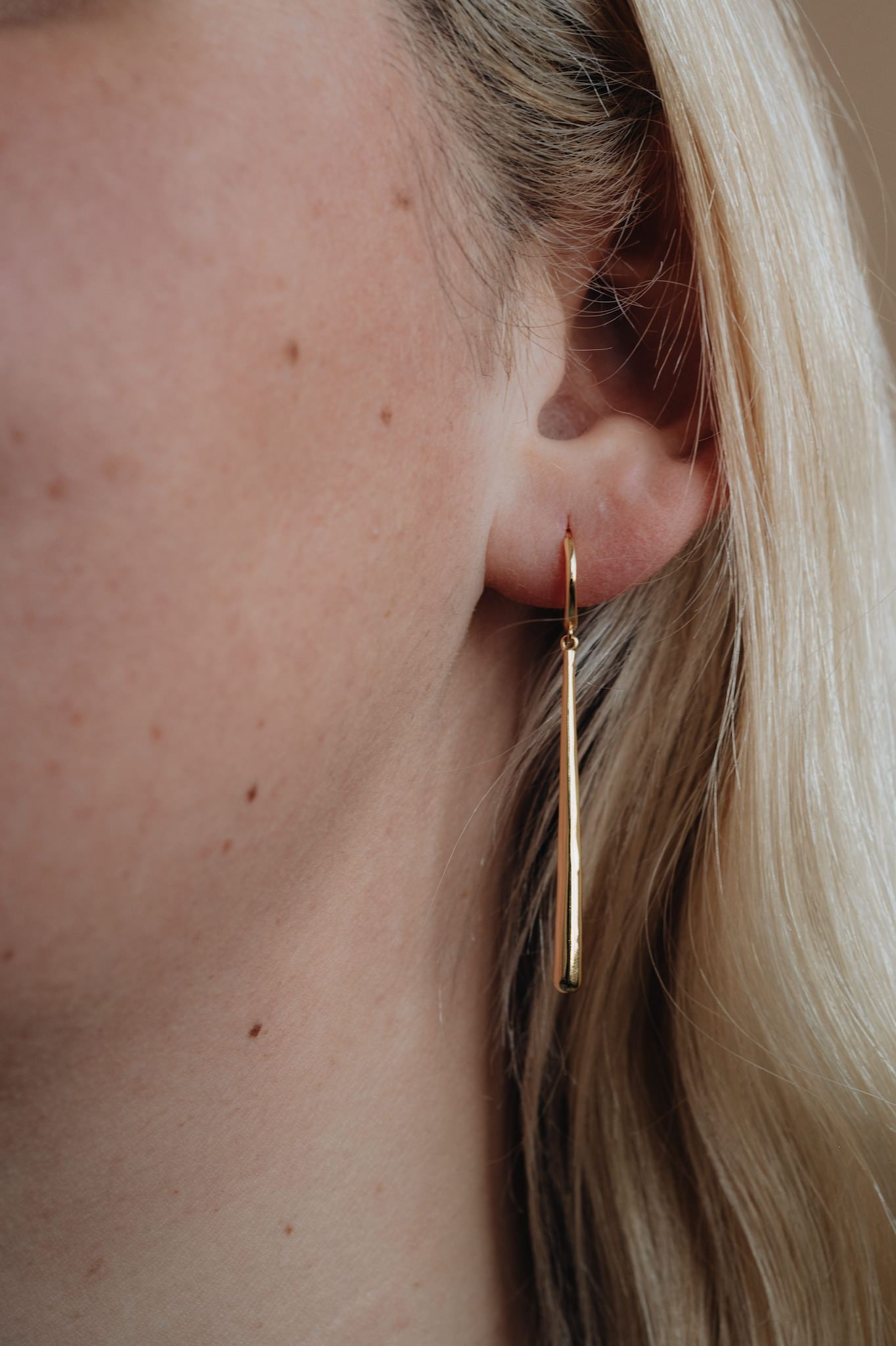 Golden Pendulum Earrings. Vela