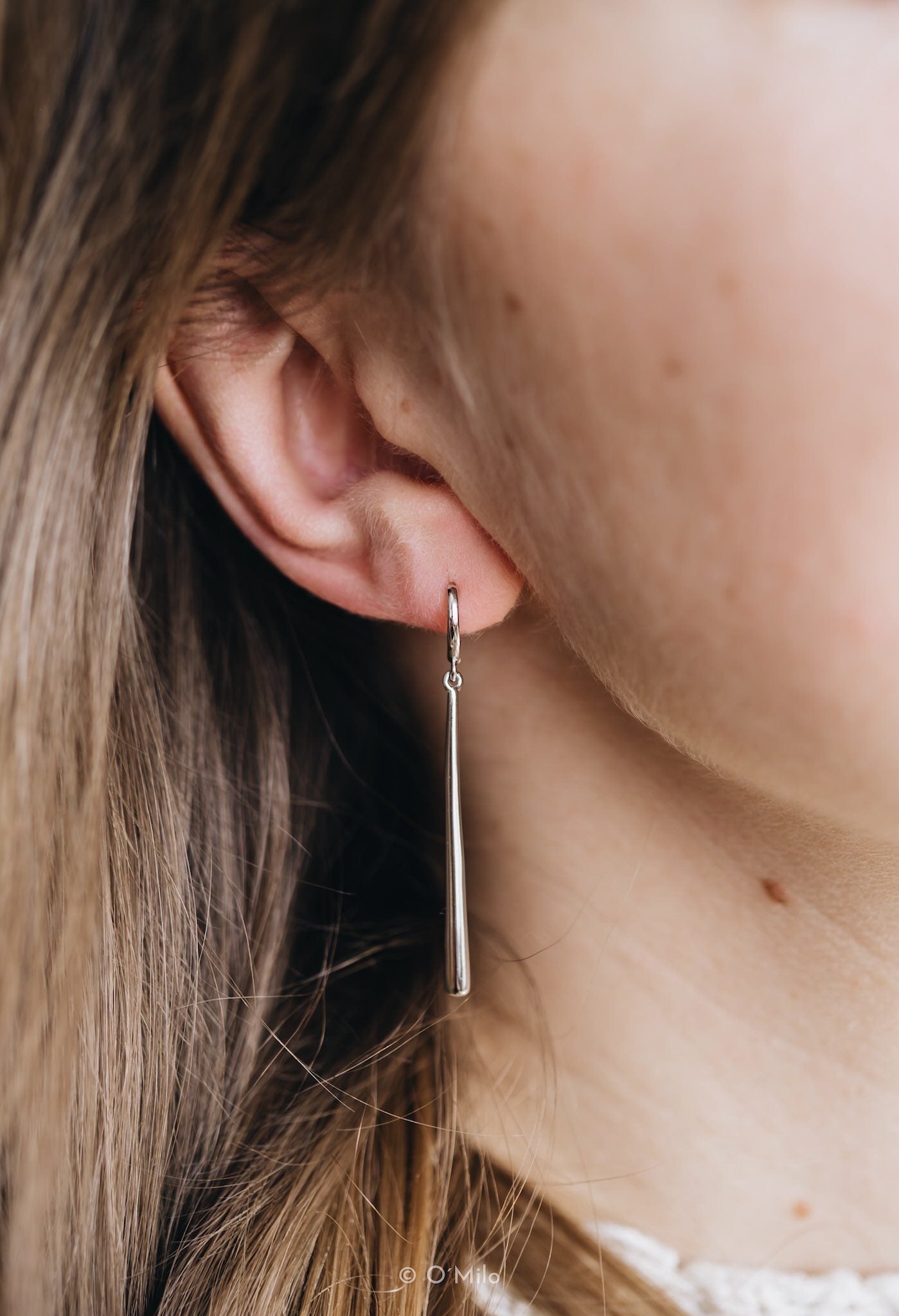 Golden Pendulum Earrings. Vela